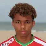 Logan Ndenbe headshot