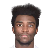 John Kitolanodisparo a la cabeza