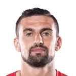 Bartosz Śpiączkadisparo a la cabeza